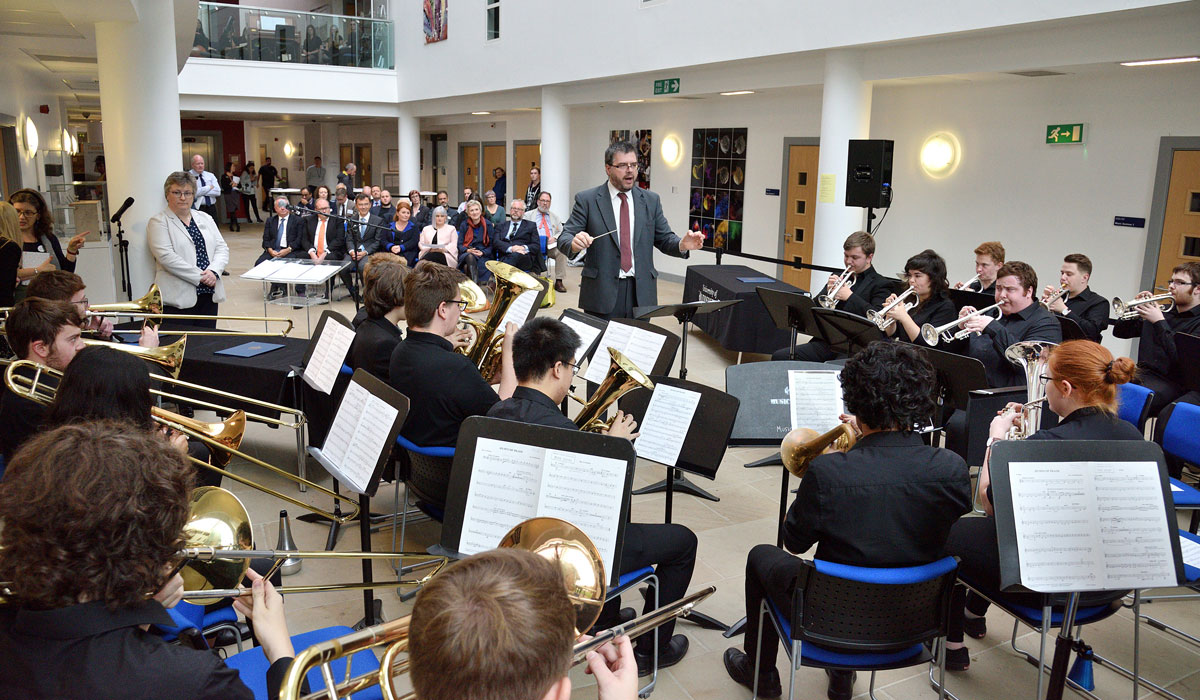 The University’s Brass Band play at the signing ceremony