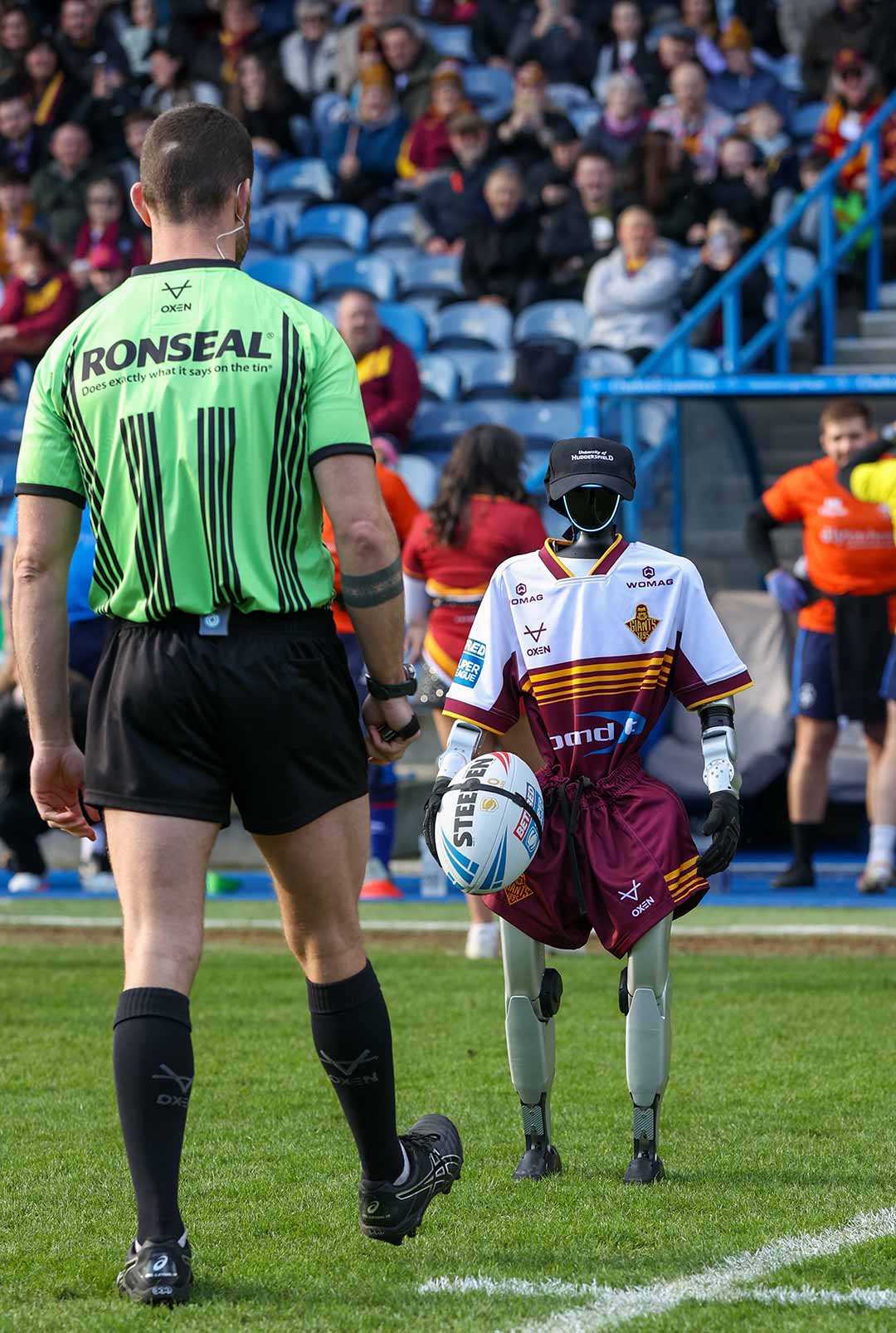 Harold the Robot on the pitch at the Accu stadium to meet the Rugby Referee