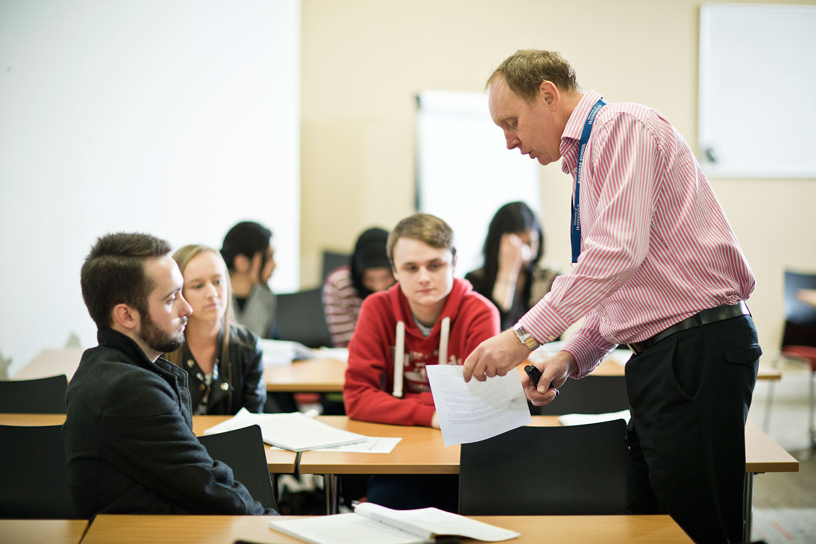 Accountancy with Financial Services lecturer with a student in a classroom