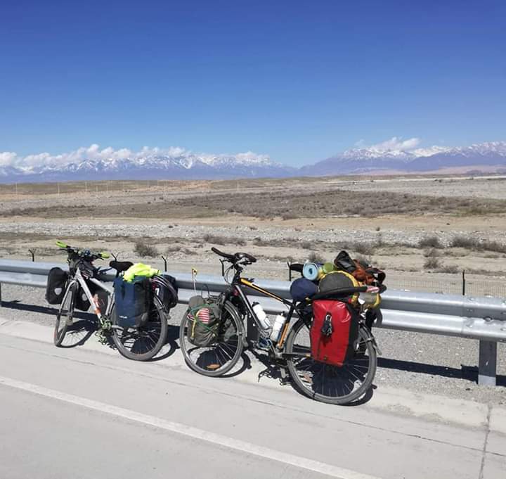 2 bikes parked up with an incredible view