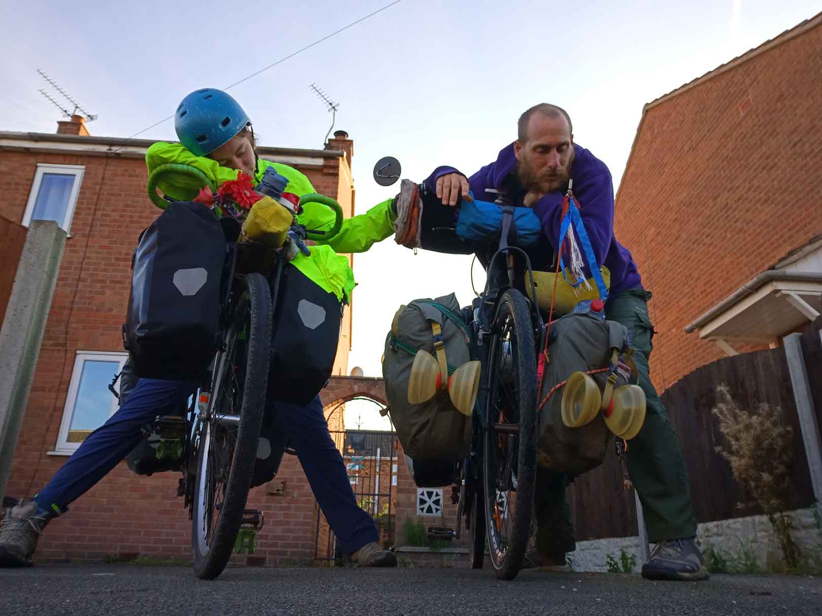 David and Ellie looking exhausted on their bikes
