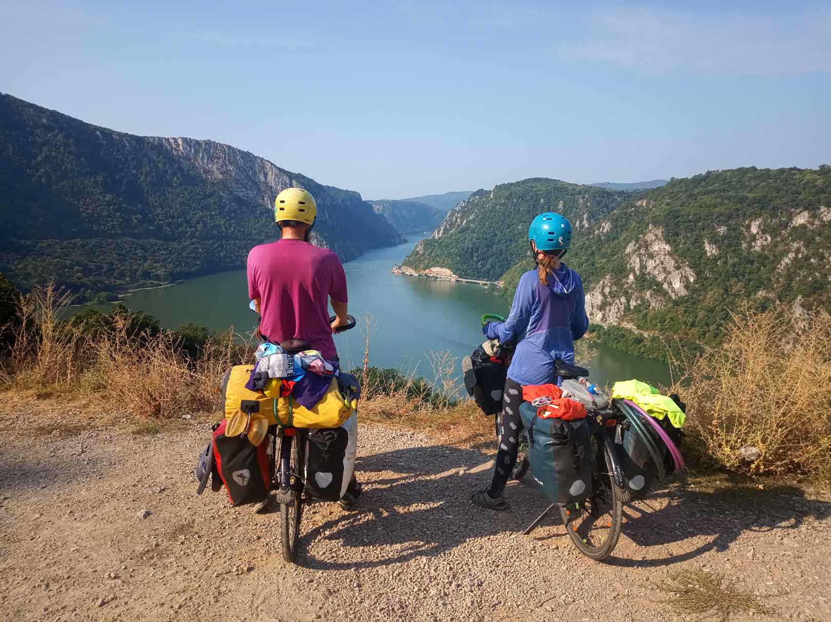 David and Ellie on their bikes looking at an incredible view