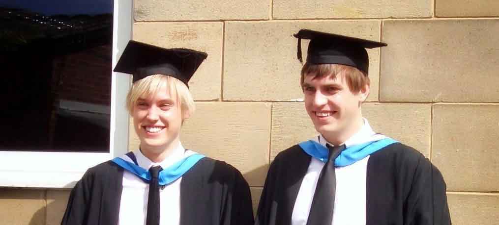 Chris and Matt Bell-Watson at graduation in their cap and gowns