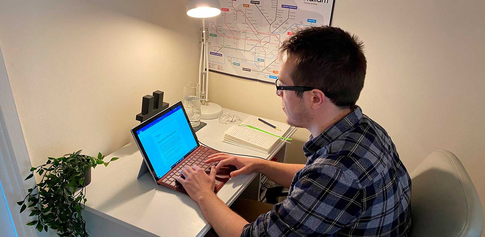 Graduate Tom Bestwick working from home in his new role at agency Hallam