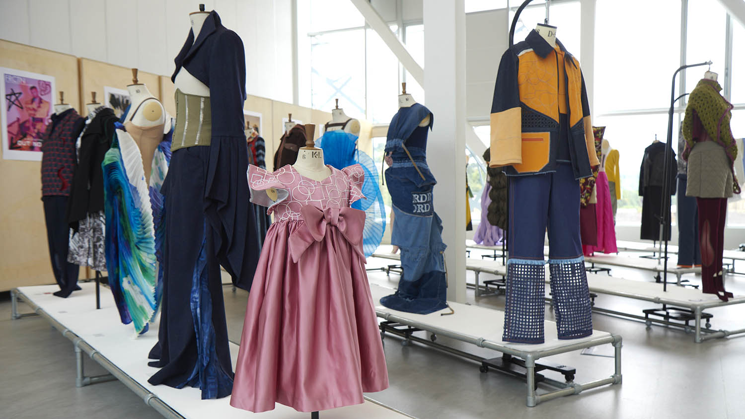 Several Garments displayed on Mannequins