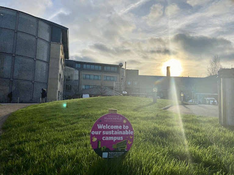 Sustainable campus sign sunset