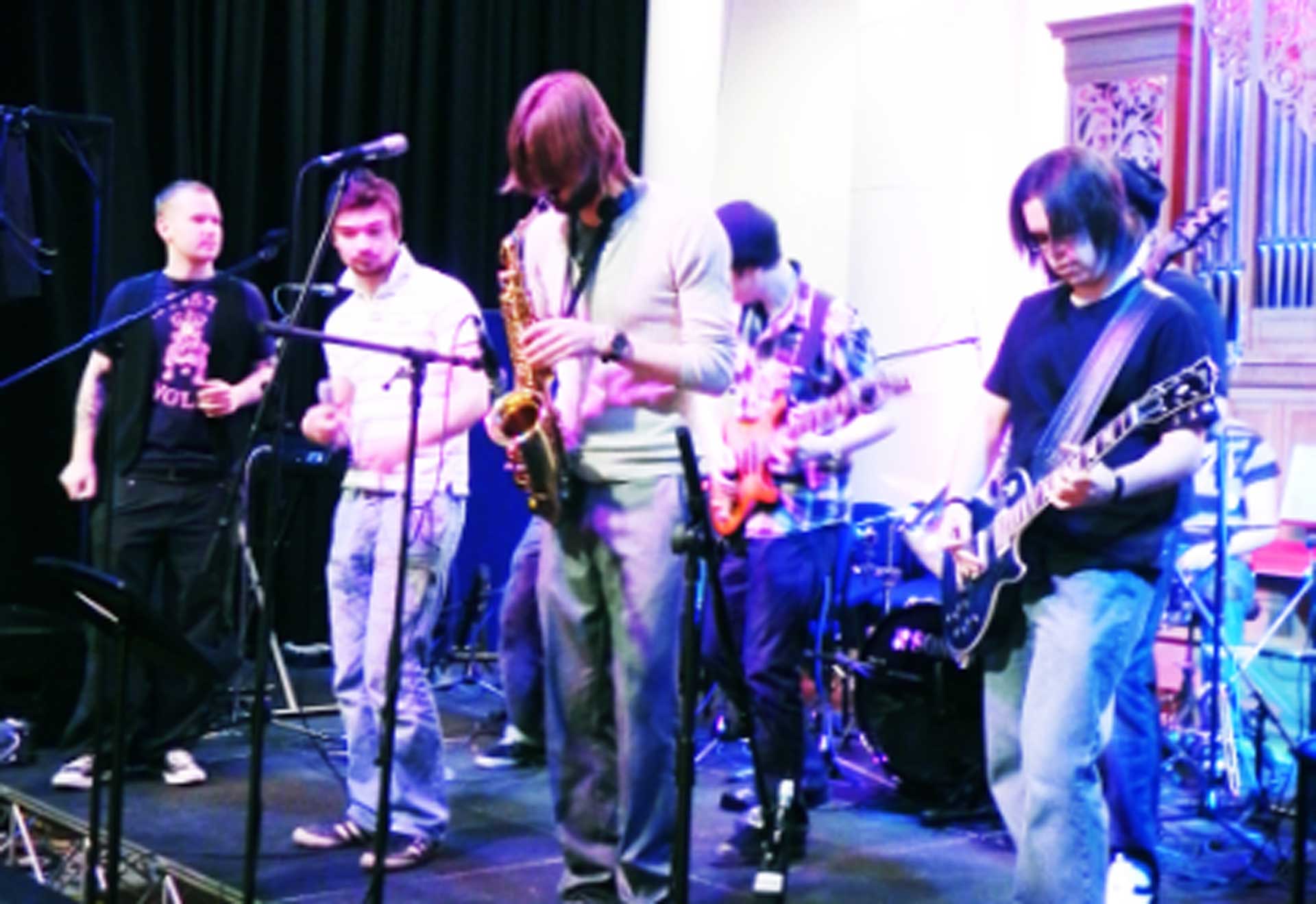 A band performing on a stage.
