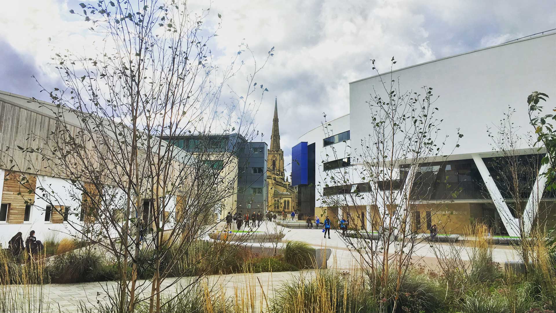 Picture of University Square from behind bushes