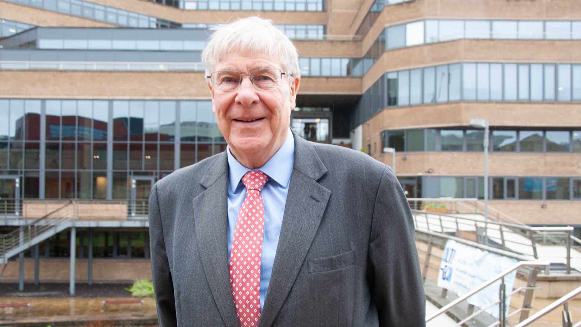 Peter Shaw outside Huddersfield Business School