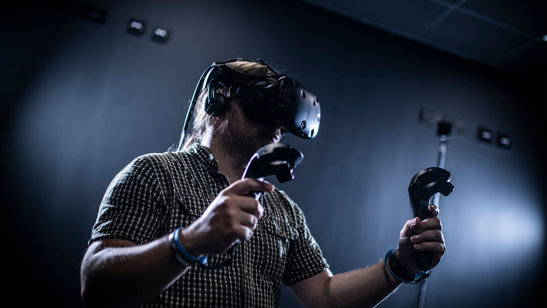 Student working on an immersive computing headpiece