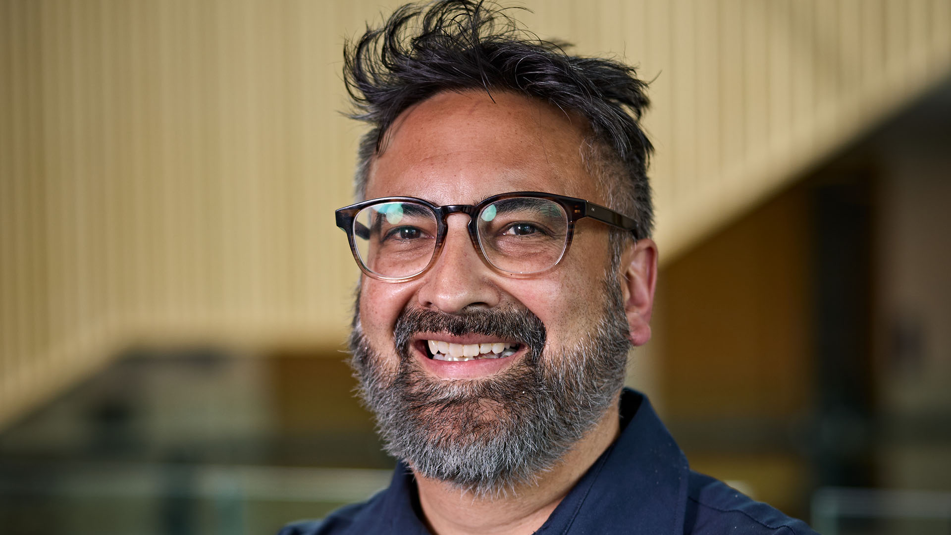 Santok Gill smiling at the camera