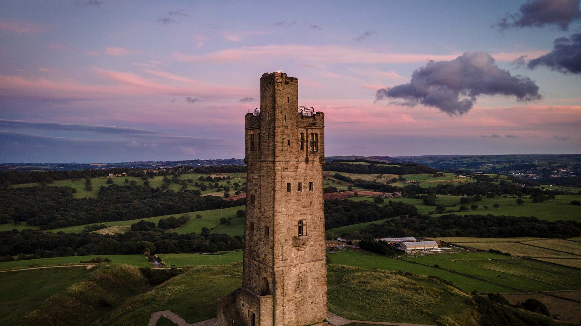 A aerial photo of Castle Hill in Huddersfield on an evening