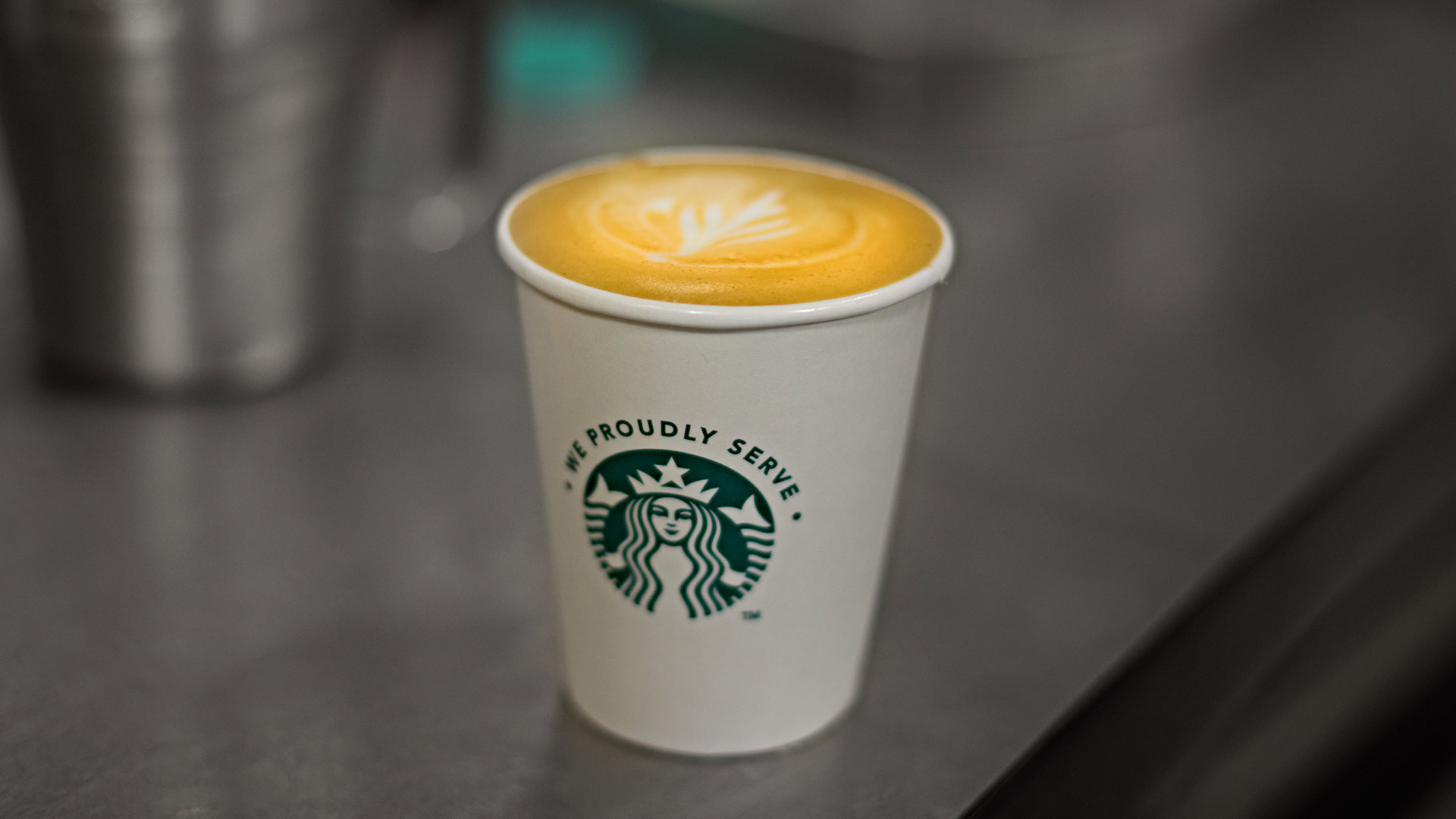 A photograph of a cup of coffee from Starbucks
