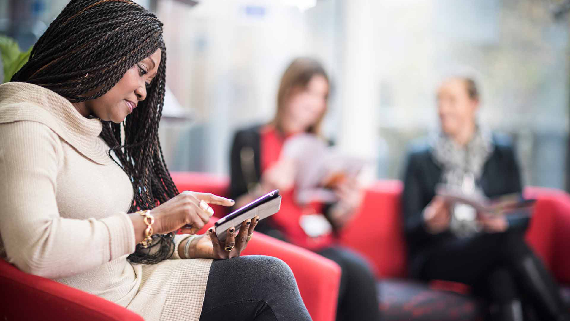 Student reading brochure in lockside