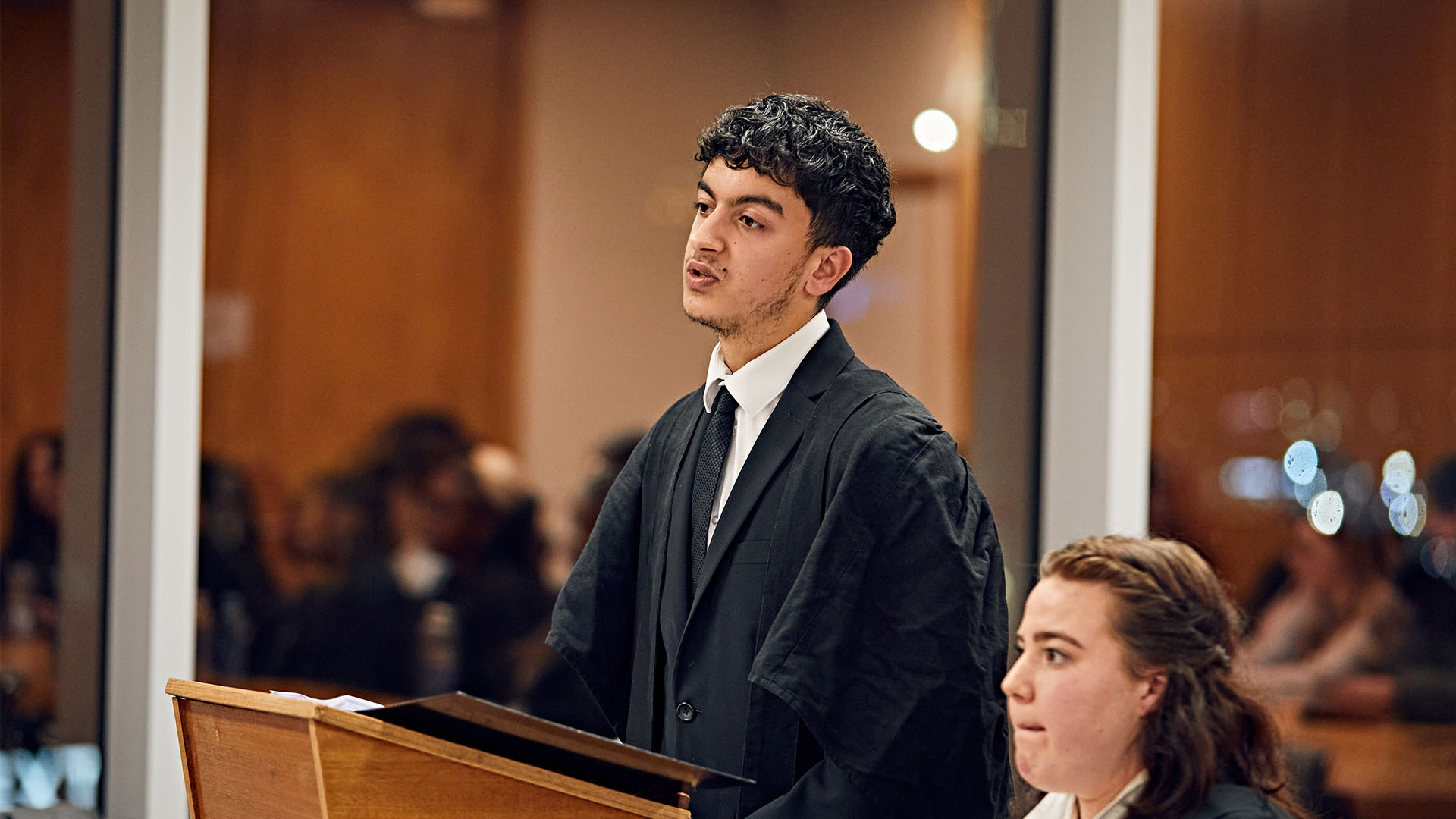 Student speaking in courtroom