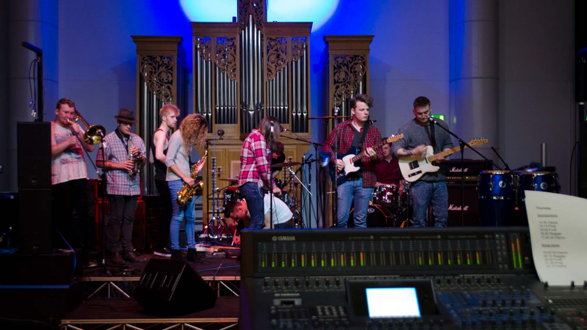 A band performing on a stage.