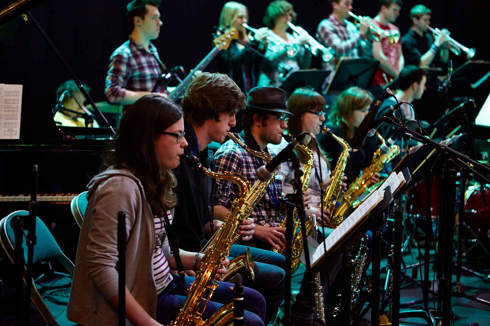 An image of a band playing in an event.