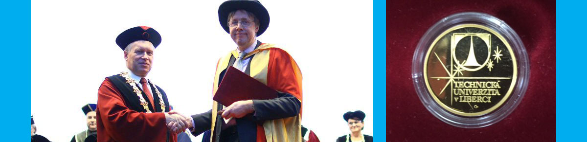 Professor John Anchor (right) receiving his award from the Rector of the Technical University of Liberec, Professor Zdenek Kus
