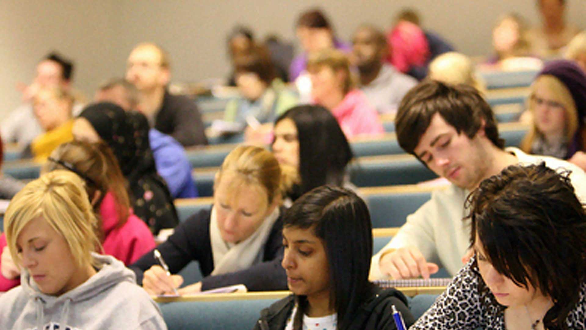 student taking notes at Psypag conference