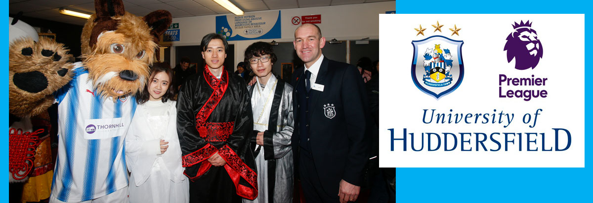 Chinese students with former Huddersfield Town player Andy Booth (right)