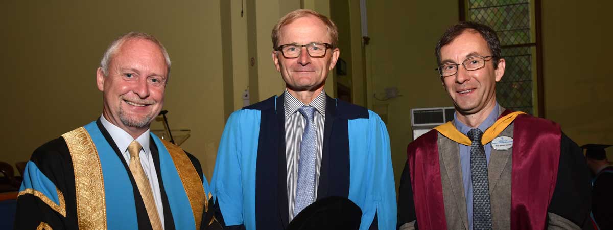 Honorary award recipient Colin Dennis (centre) with the University's Pro Vice-Chancellor for Research, Professor Andrew Ball (left) and the Director of the Institute of Railway Research, Professor Simon Iwnicki (right)