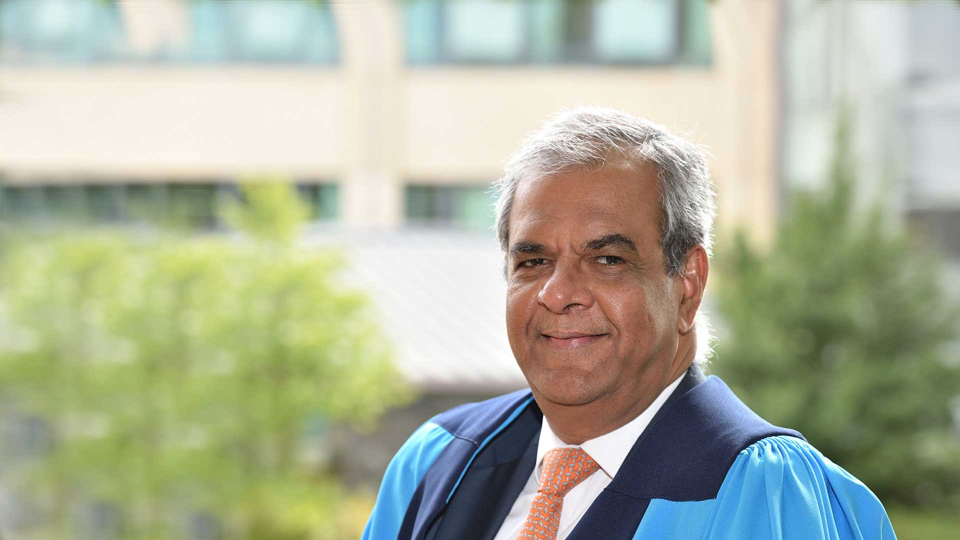 Ashok Vaswani, CEO of Barclays UK, receiving his honorary award