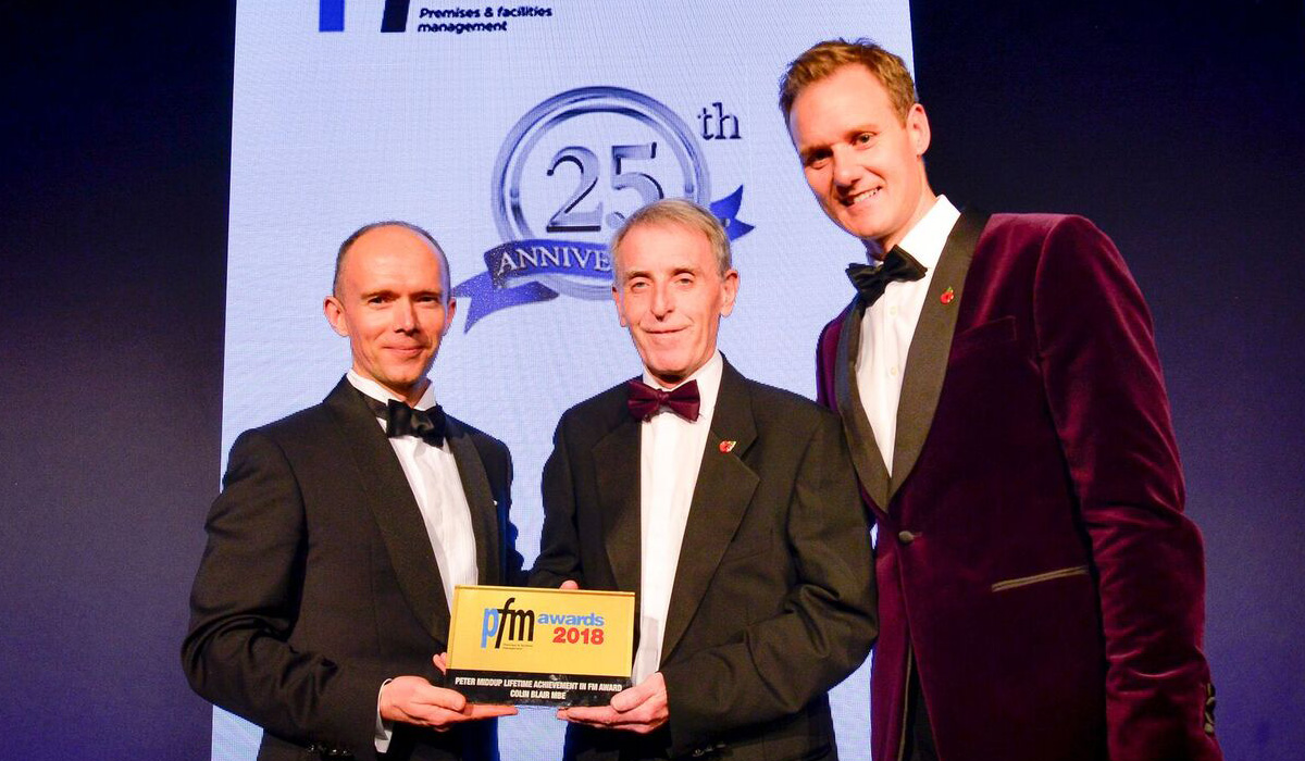 Colin Blair (centre) receiving his award from Alistair Craig, Anabas MD (left), with TV presenter and compere Dan Walker (right)
