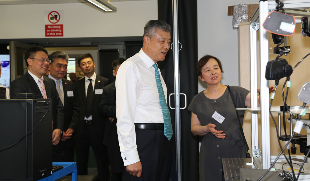 His Excellency Liu Xiaoming is escorted by Professor Dame Xiangqian Jiang
