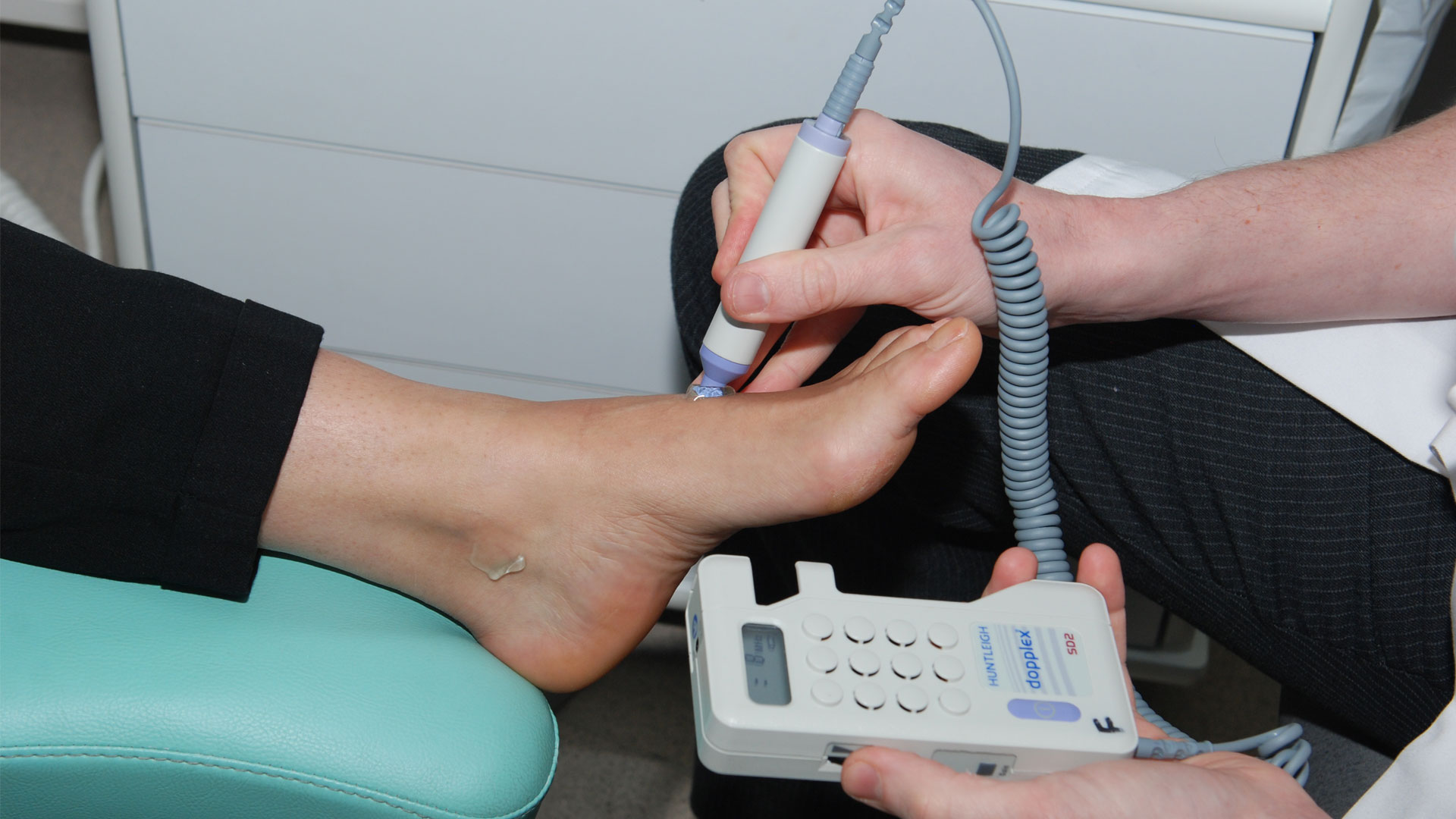 Using a Doppler ultrasound on a patient