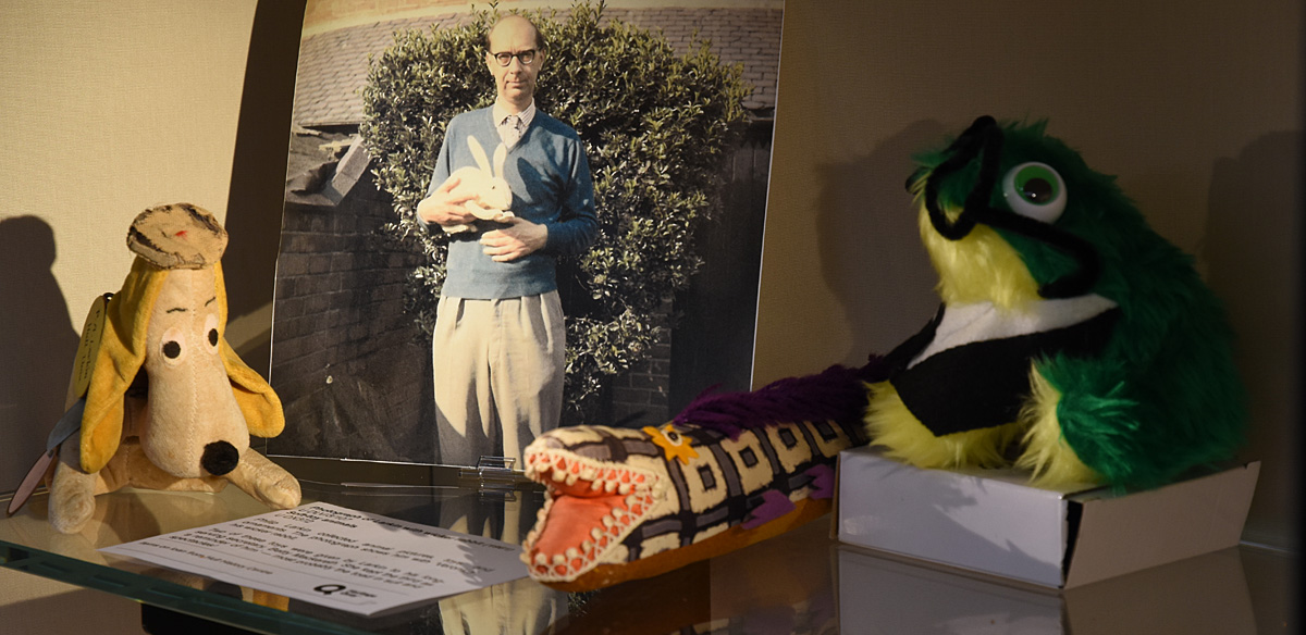 Philip Larkin collected animal pictures, toys and ornaments.  The photograph shows him with ‘Veronica’, his wicker rabbit.  Two of the toys on display were given by Larkin to his long-serving secretary, Betty Mackereth.  She kept the third, probably the toad in spectacles, as a reminder of him.