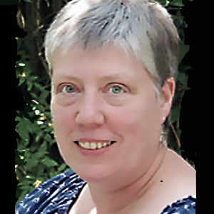 Dr Mary Turner smiling to camera