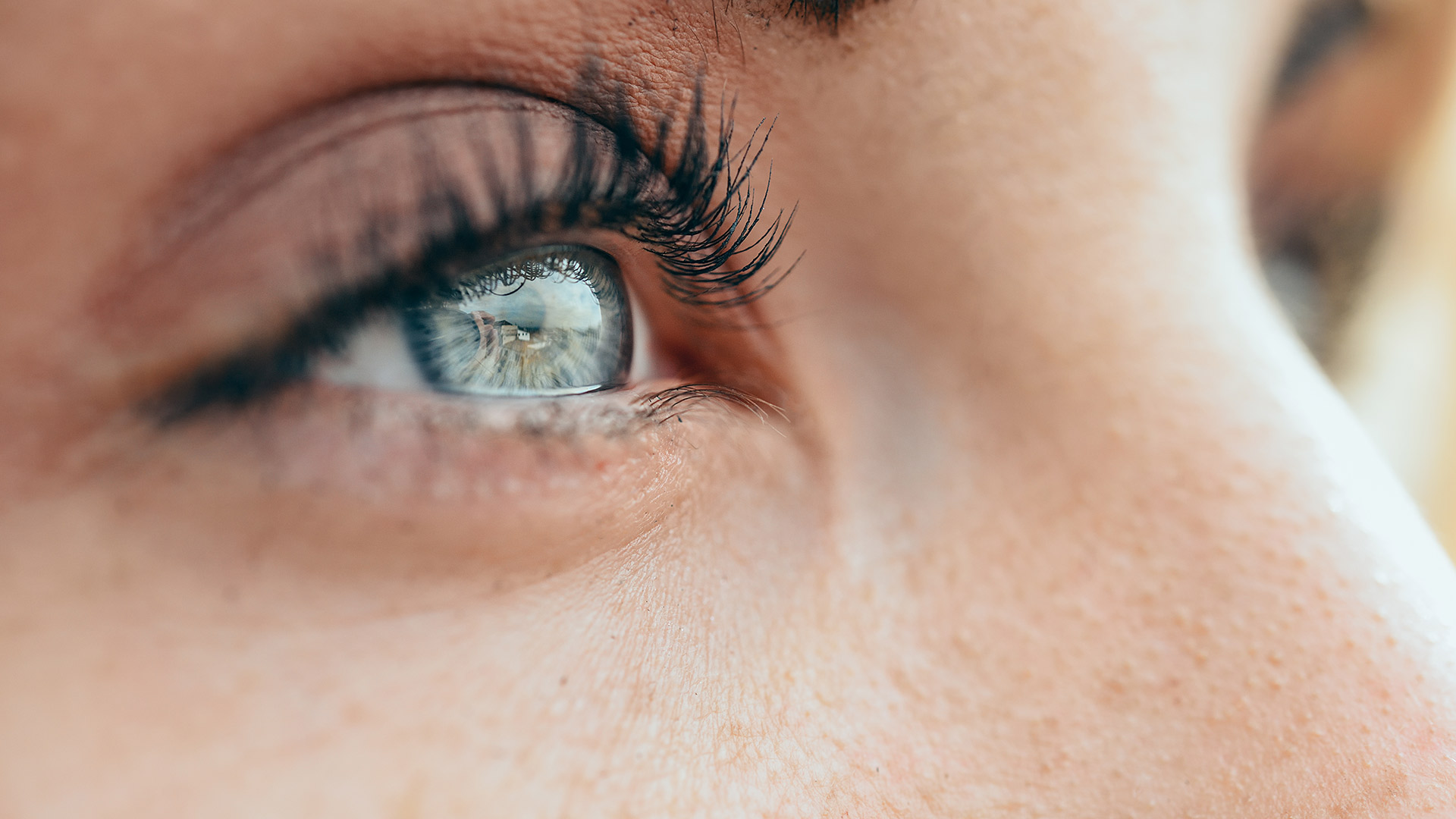 a close up of a woman's eye