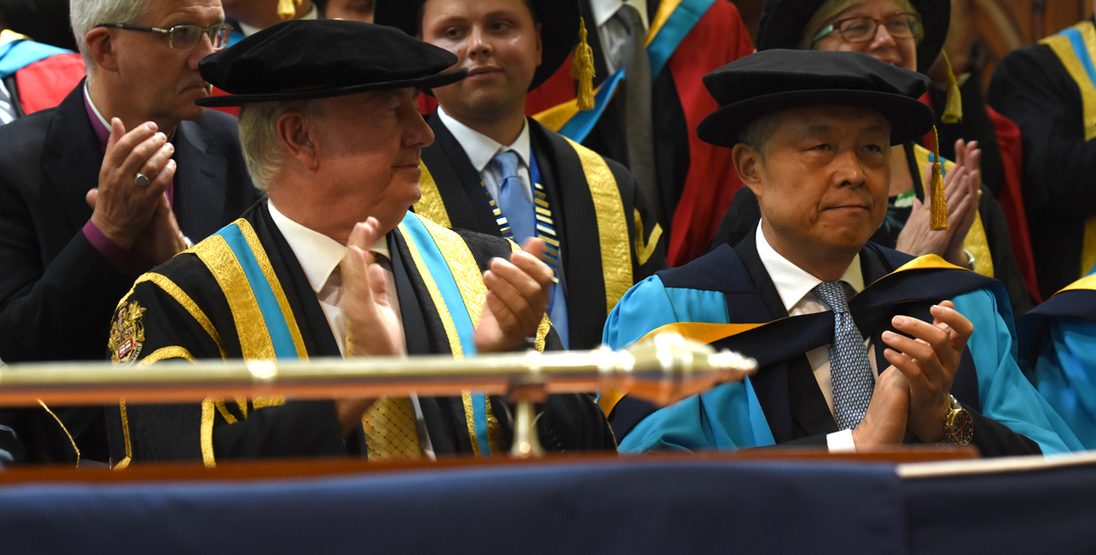 The Chinese Ambassador to the UK, His Excellency Liu Xiaoming (right), is pictured at the award ceremony where he received his honorary award with the University's Vice-Chancellor, Professor Bob Cryan (left).