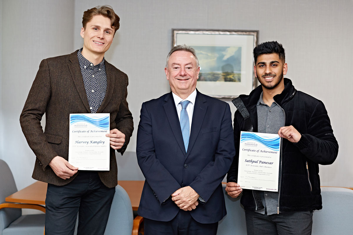Pictured with the University's Vice-Chancellor Professor Bob Cryan (centre) are the KTP poster prize-winners Harvey Kangley (left) and Sathpal Panesar