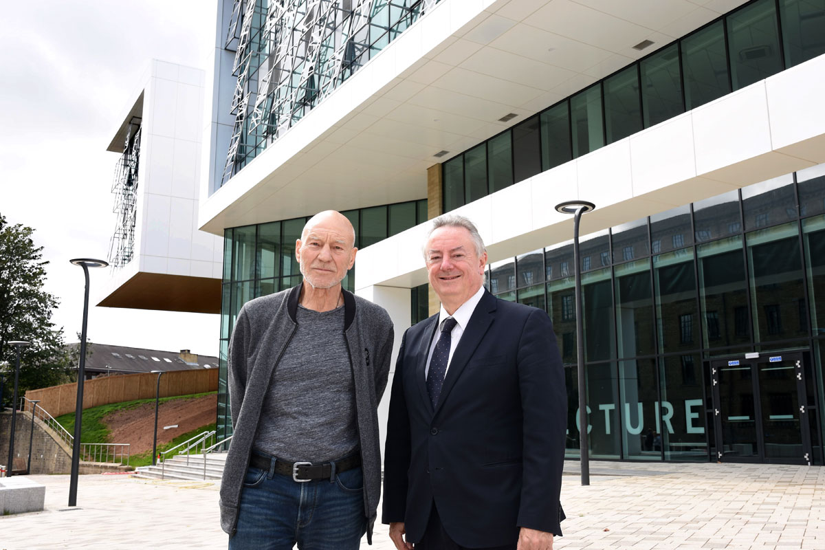 Sir Patrick Stewart with the University's Vice-Chancellor, Professor Bob Cryan, outside the £30m award-winning Barbara Hepworth Building