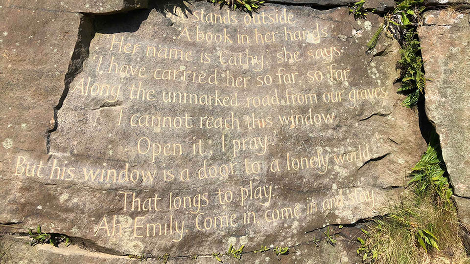 The Emily Bronte stone with a poem by Kate Bush carved into the surface