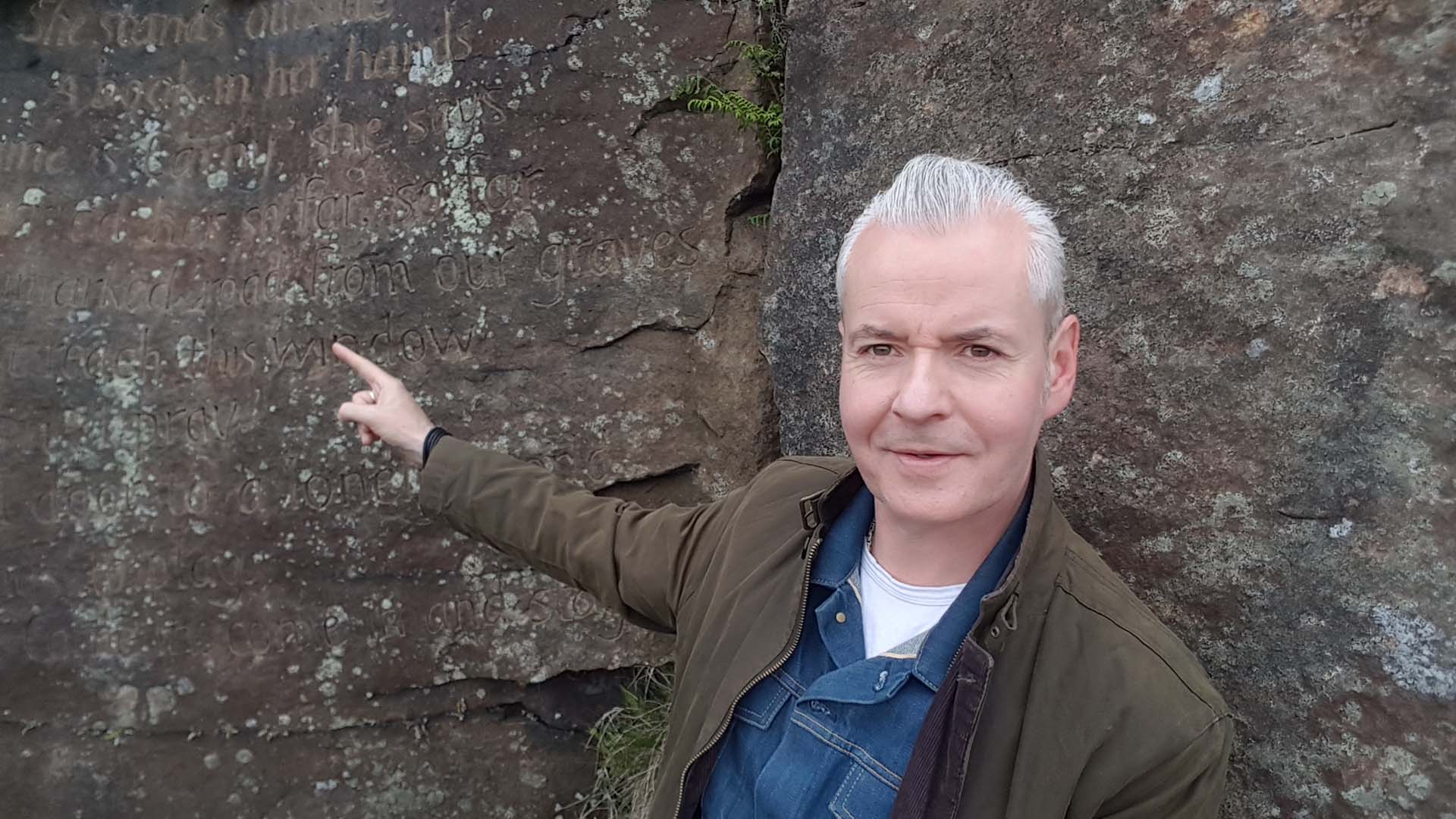 Dr Michael Stewart and the Emily Stone with a poem written by Kate Bush at Ogden Kirk