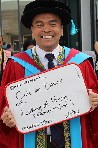 Dr Rex Belang with a message about his PhD at graduation