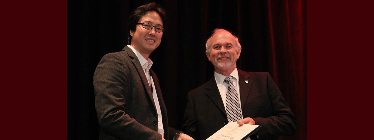 The University’s Dr Hyunkook Lee (left) is pictured with the AES President David Scheirman.