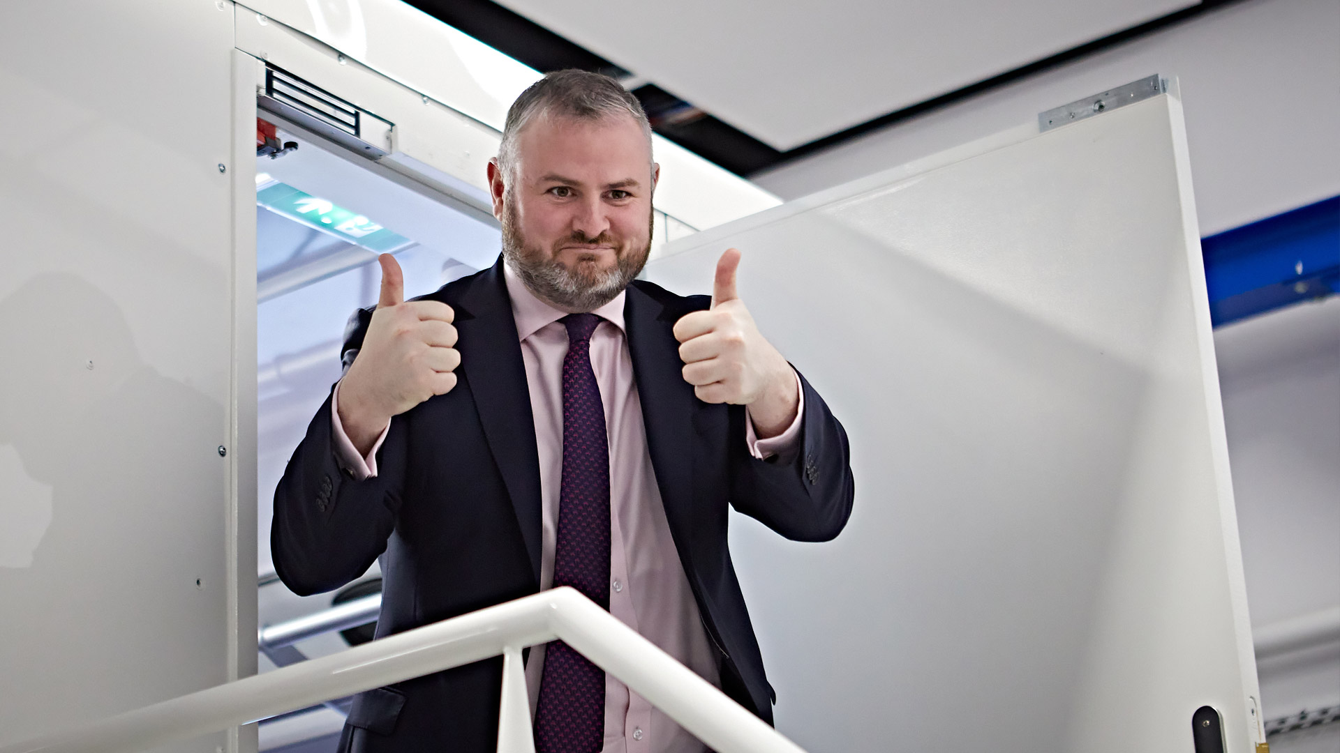 Andrew Stephenson MP gives the thumbs up after his experience on THOMoS, the motion platform-based laboratory simulator
