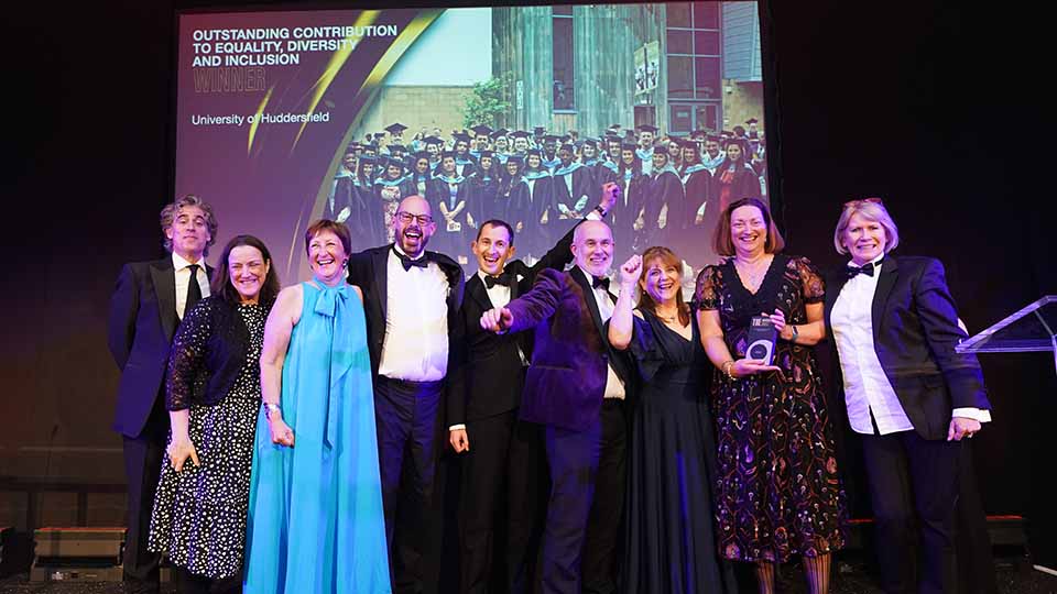 University of Huddersfield staff receiving an award