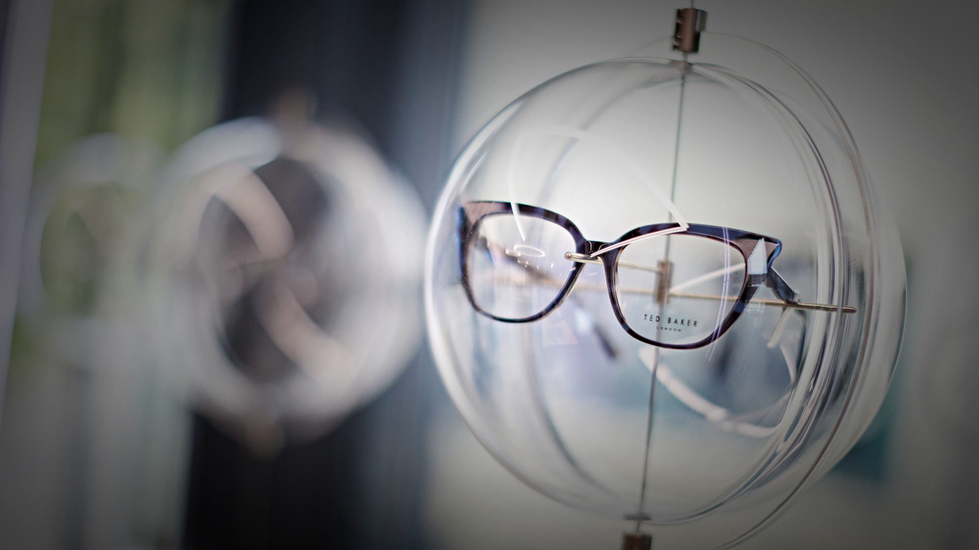A frame of spectacles on display in the window of University Valli Opticians
