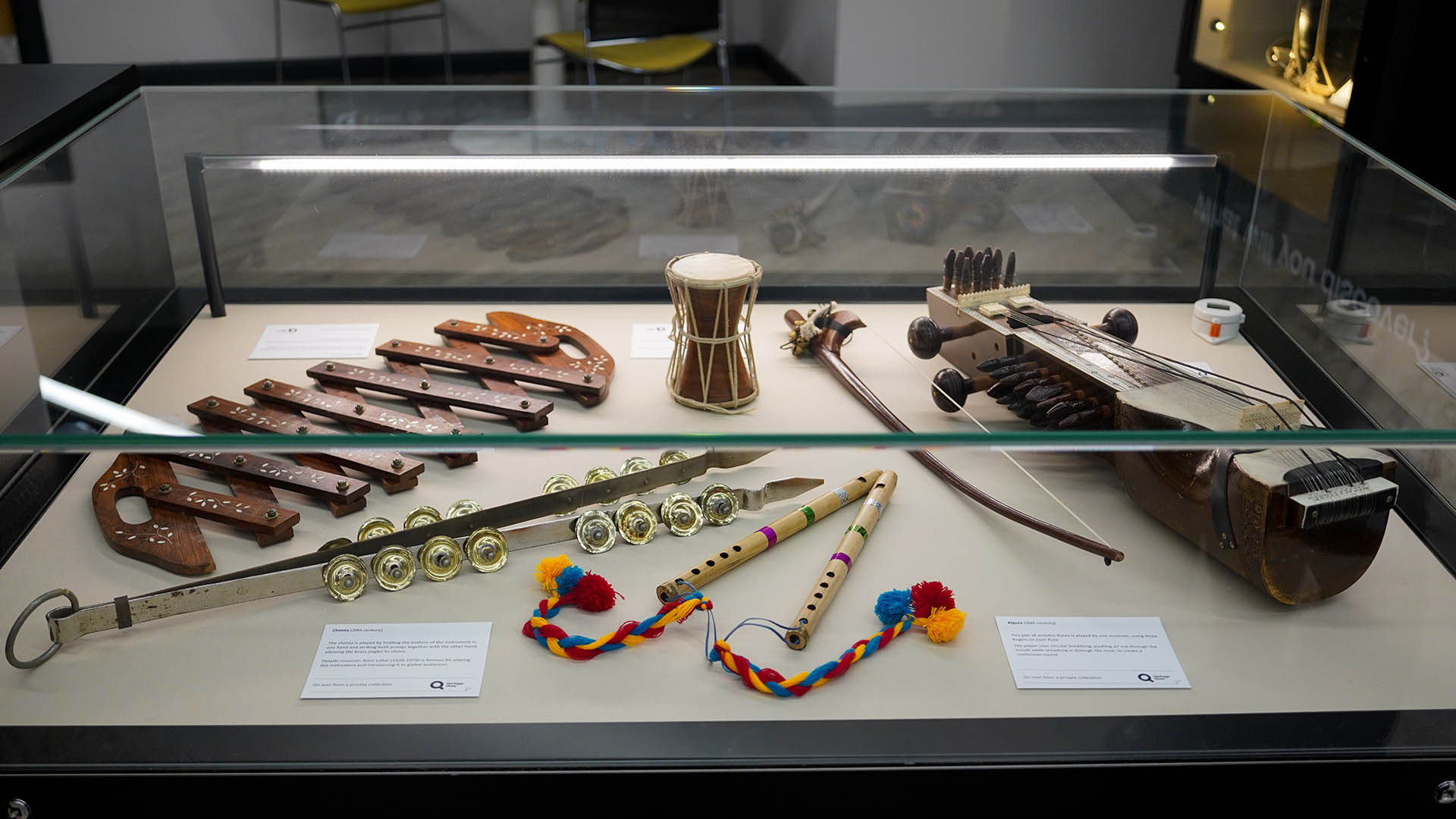 Some bhangra items in a glass case