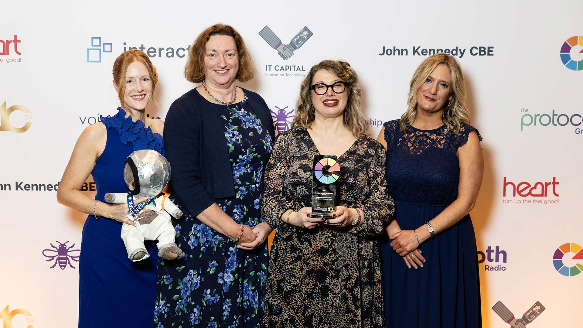 A group from the University of Huddersfield being presented with an award