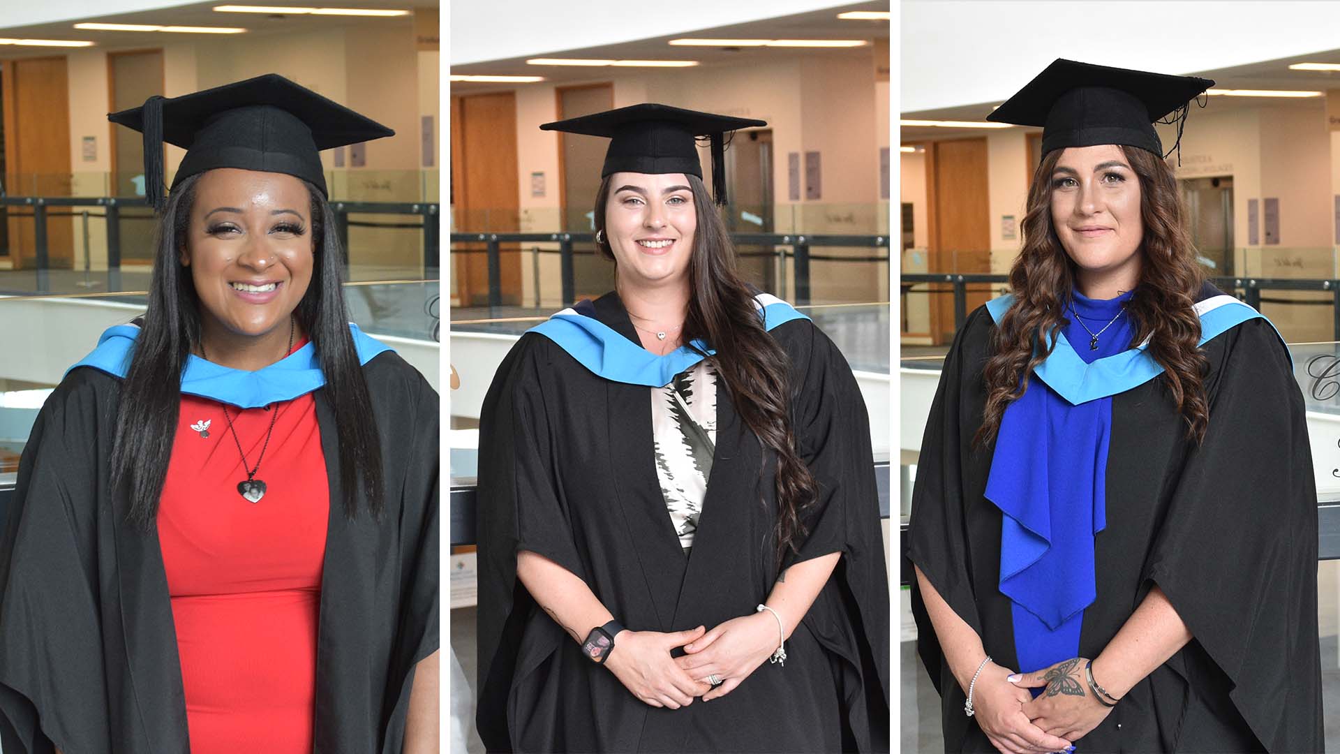 Three students in their graduation gowns and mortar boards