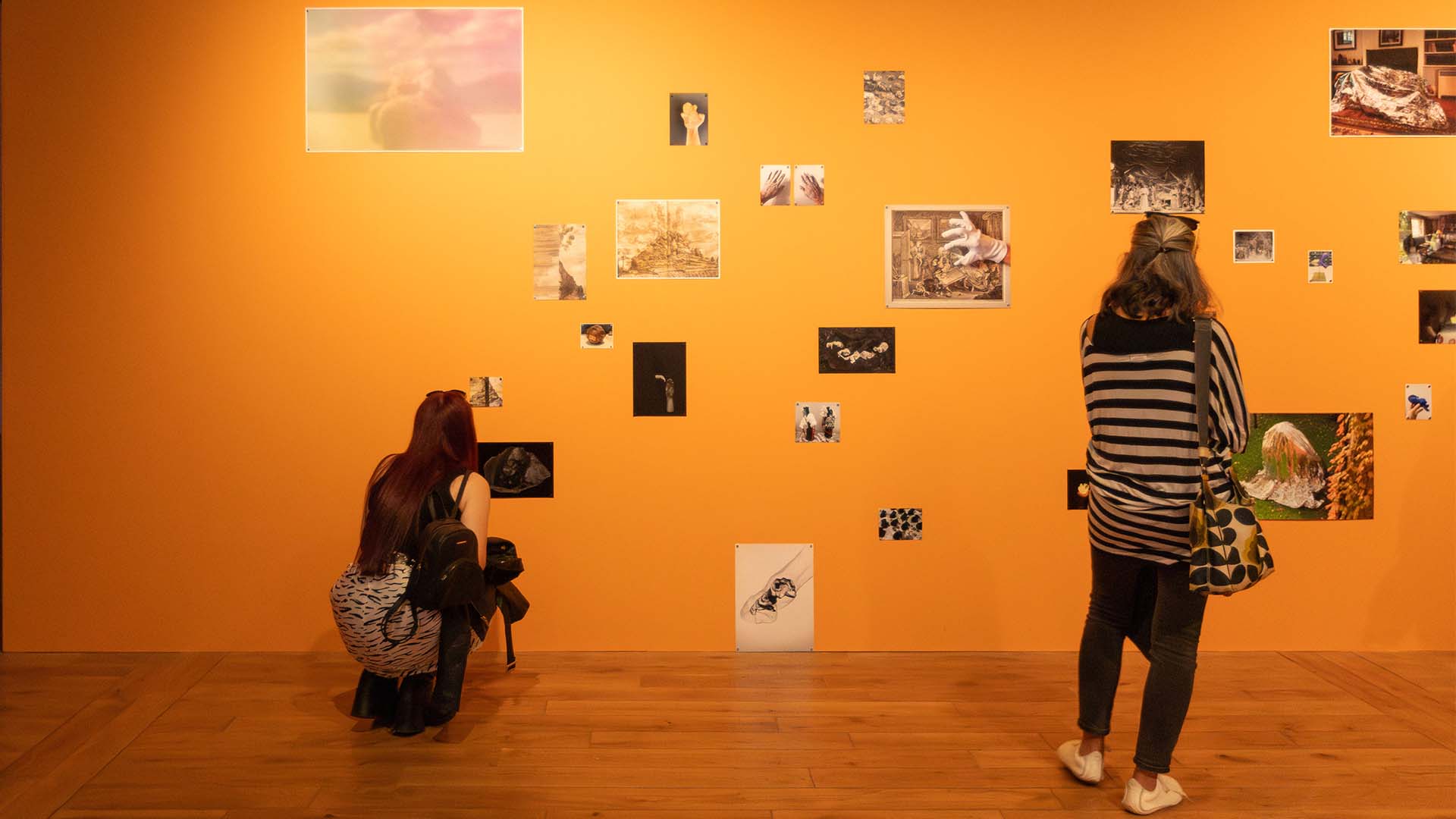 People looking at a Brass Art installation