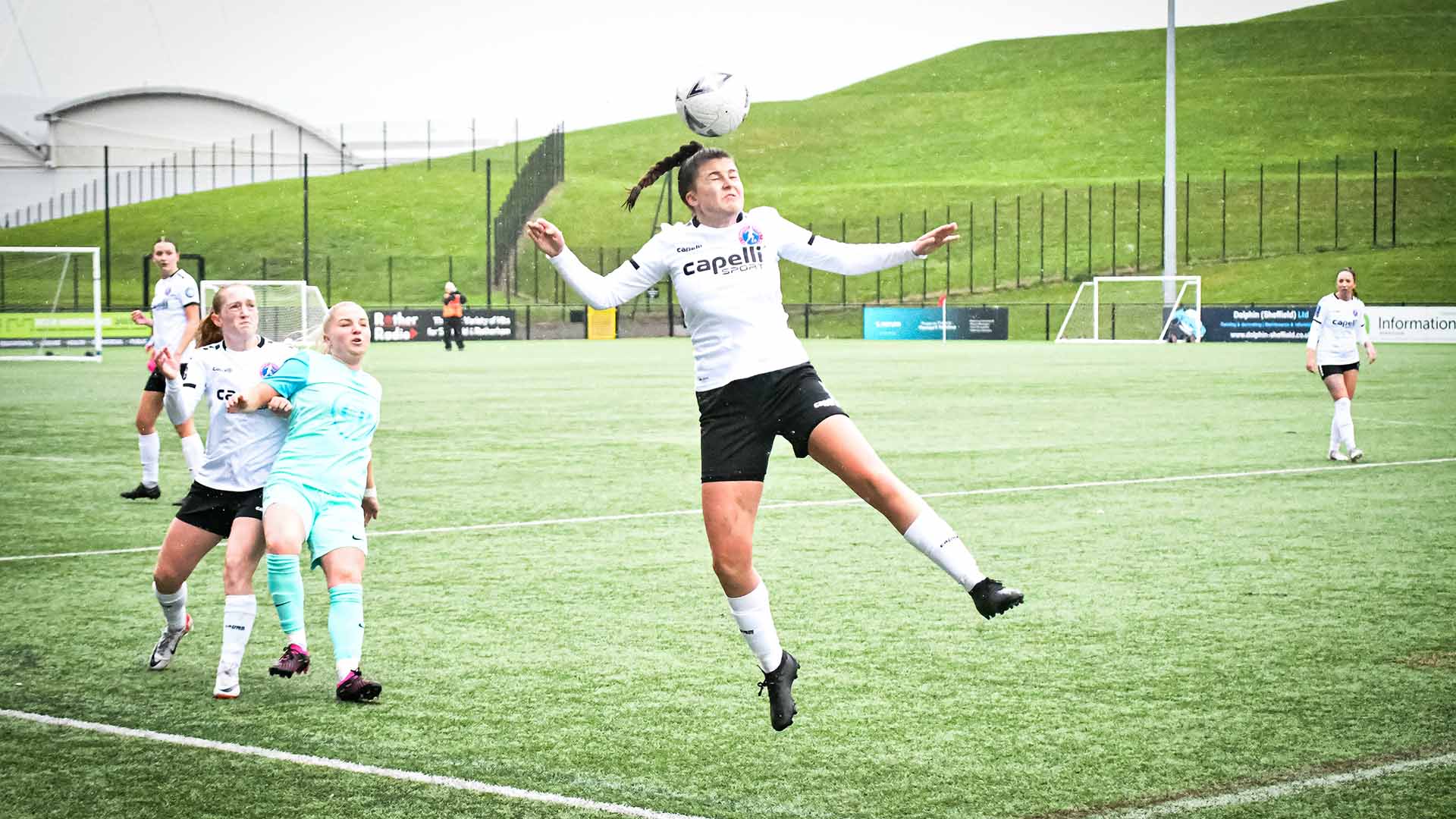 Autumn Housley heads the ball