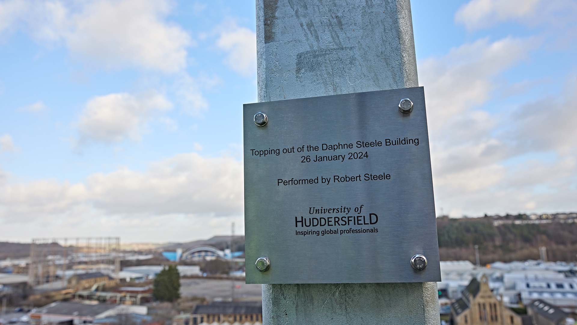A plaque at the Daphne Steele Building