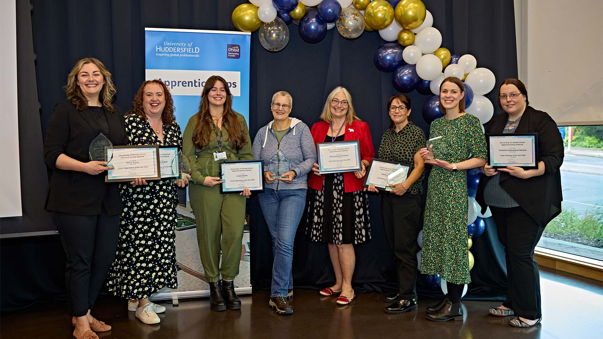 winners lined up with their awards