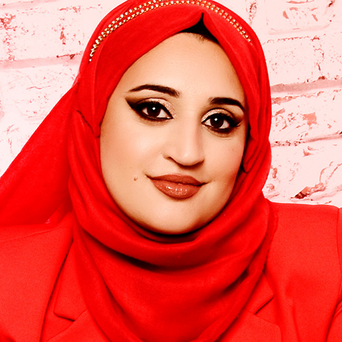Sarah Hussain looks at the camera